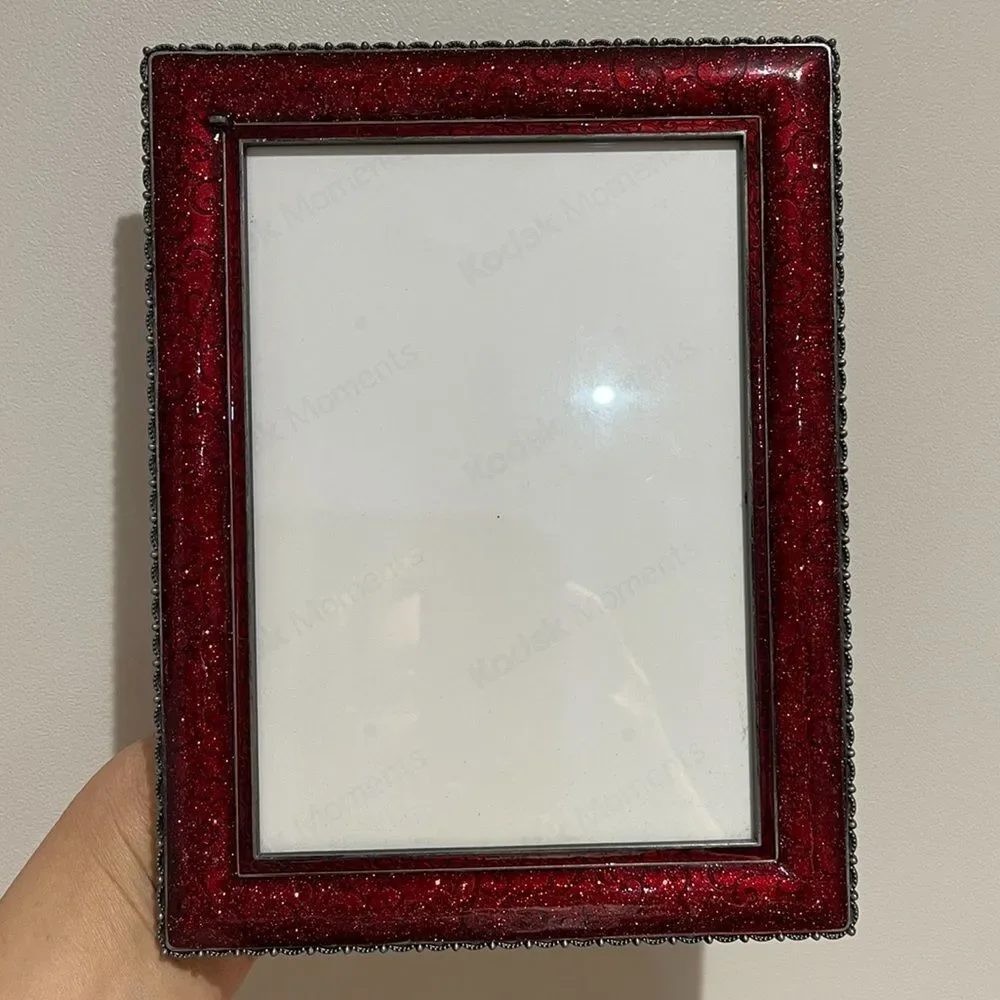 Three burgundy frames